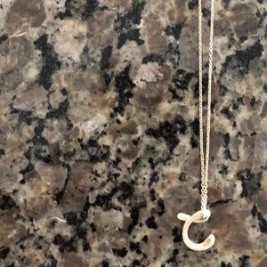 Tiffany letter “C” from Elsa Peretti collection